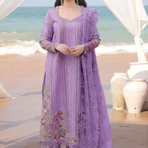Woman wearing lavender embroidered 3 piece lawn suit with matching dupatta at beach